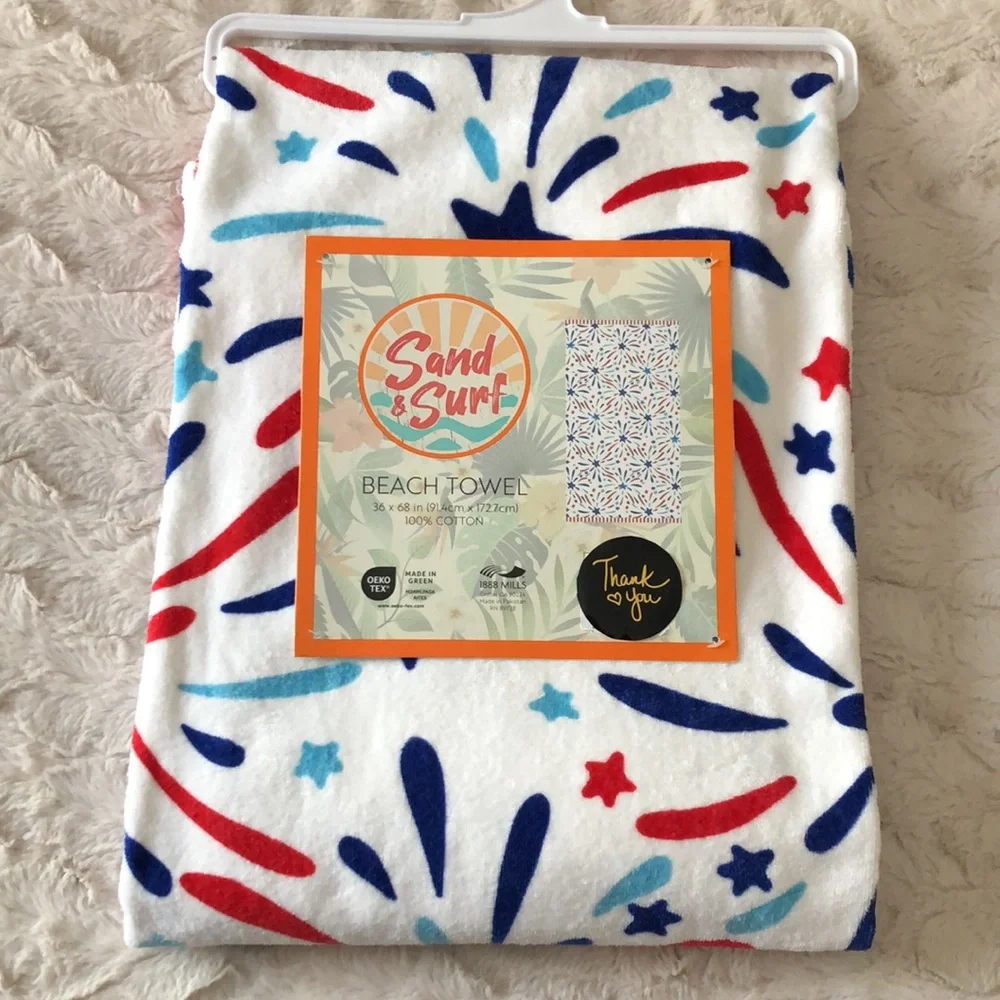 White Beach Towel with Red, Blue and Light Blue Starburst Print